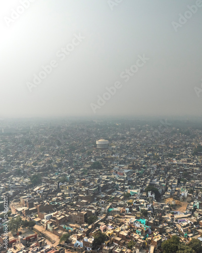Wallpaper Mural Aerial view of dense urban skyline with beautiful architecture and crowded rooftops, Tajganj, India. Torontodigital.ca