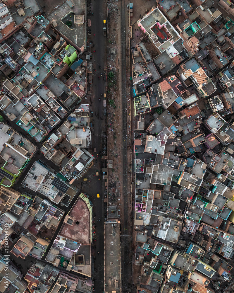 Aerial view of colorful and dense urban landscape with railway and traditional architecture, Bikaner, India. Aerial view of colorful and dense urban landscape with railway and traditional architecture, Bikaner, India.