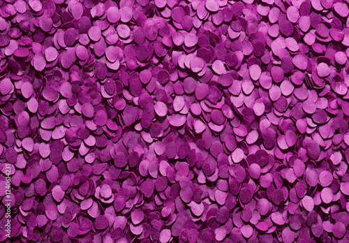 
A vibrant pink glitter texture background with shimmering particles, perfect for adding a festive and sparkling touch to designs. The bright purple undertones bring energy and excitement, making it i photo