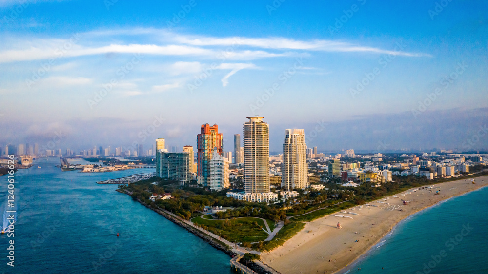 Aerial view of vibrant miami beach skyline with modern skyscrapers and beautiful coastline, miami beach, united states. Aerial view of vibrant miami beach skyline with modern skyscrapers and beautiful coastline, miami beach, united states.