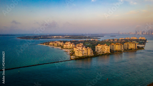 Aerial view of beautiful Miami Beach with modern skyline and turquoise ocean, Miami Beach, United States. photo