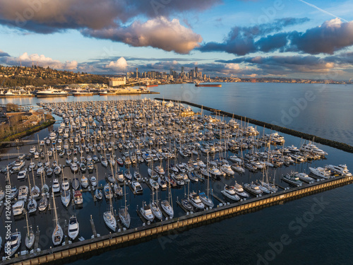 Aerial view of Smith Cove Marina with beautiful boats and a serene skyline at sunset, Seattle, United States. photo