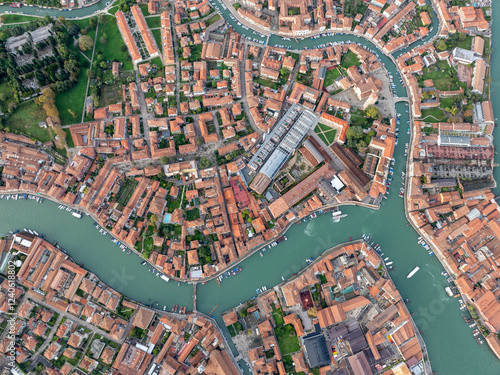 Aerial view of picturesque canals and colorful rooftops in the historic old town, Murano, Italy. photo