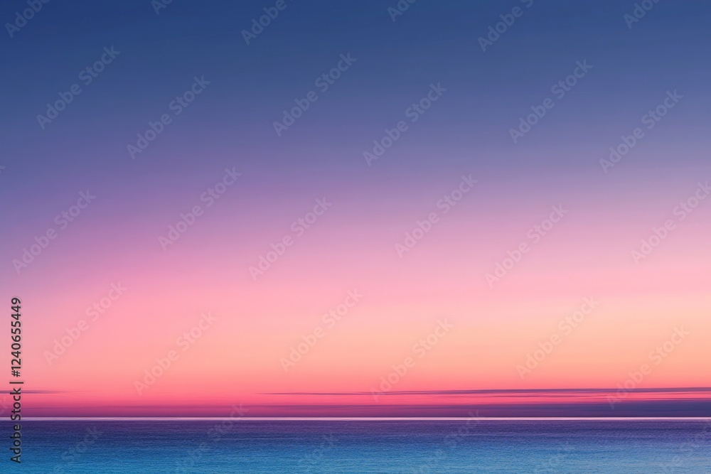 Fototapeta premium Beautiful sunset over tranquil ocean waters showcasing vibrant pink and purple hues during twilight
