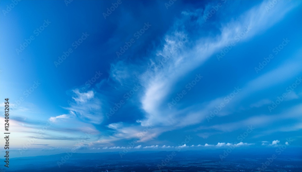 Obraz premium vibrant blue clouds swirling against a soft gradient backdrop evoking a sense of serenity and natures beauty perfect for weatherthemed designs