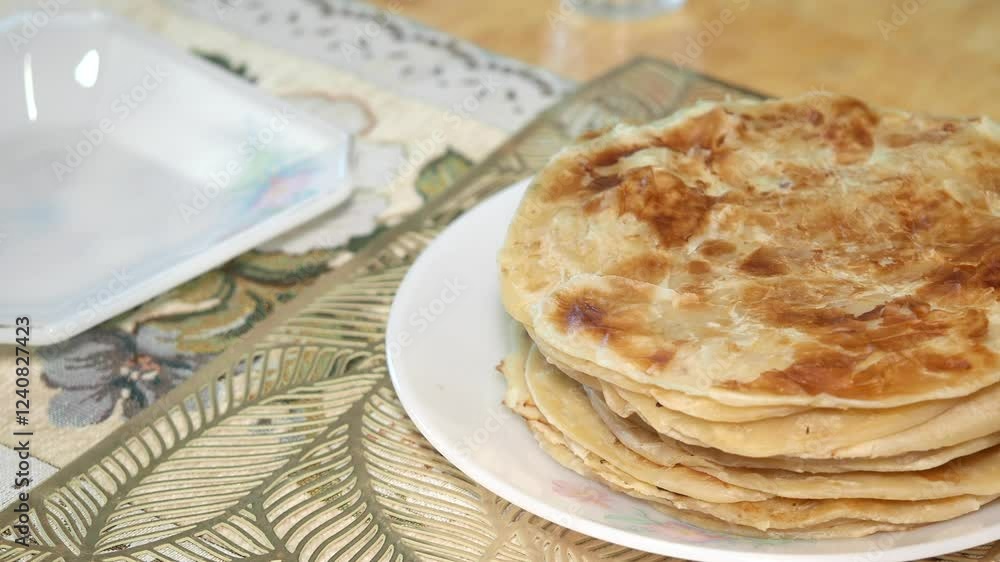 homemade roti chapati on table . homemade roti chapati on table .