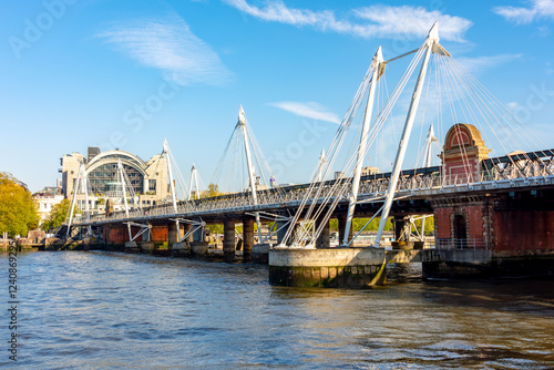 Photography Hungerford bridge and Golden Jubilee bridges over Thames river, London, UK
