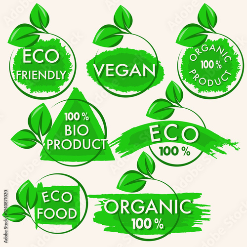 set of green labels for natural eco organic products with green leaves on a white background