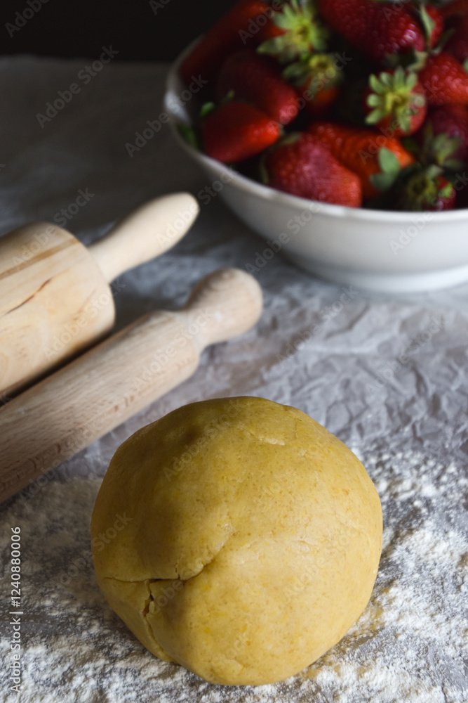 A close-up picture of homemade pie dough on the table sprinkled with flour A close-up picture of homemade pie dough on the table sprinkled with flour