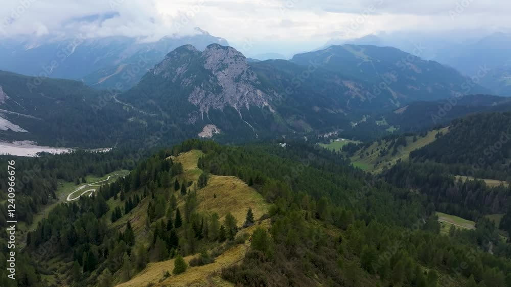 Aerial view of col de la puina with majestic mountains and lush forests, Borca di Cadore, Italy. Aerial view of col de la puina with majestic mountains and lush forests, Borca di Cadore, Italy.
