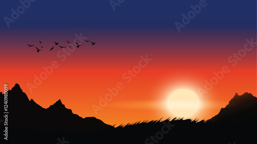 Beautiful sunset over mountains with birds flying across the colorful sky