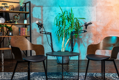 Engaging podcast setup featuring microphones and cozy chairs in a vibrant, well-decorated studio space