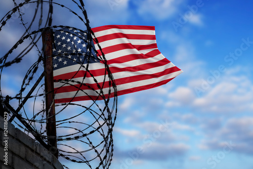 Wall with barbed wire and US flag. Concept of problems with freedom, deportation, citizenship, crisis on the border