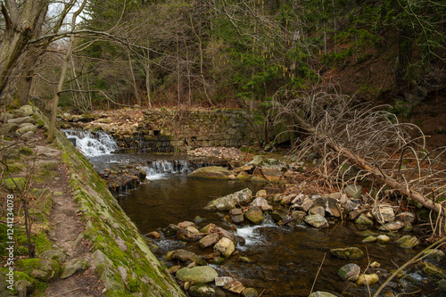 Wild Waterfall on the river Lomnica, Karpacz, Lower Silesian Voivodeship,  Poland. River bed of the mountain river Łomnica in the Karkonosze Mountains photo