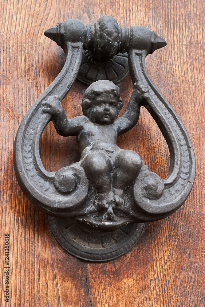 Old wrought iron knocker Old wrought iron knocker