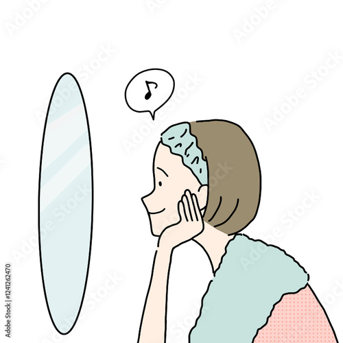 笑顔で鏡を見る女性