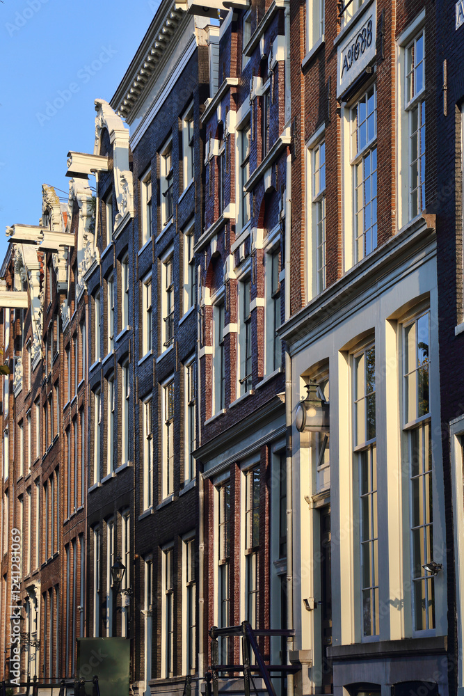 Naklejka premium Gables of historical Amsterdam houses in Holland