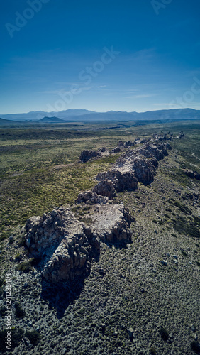 Majestic mountain peaks rising above the wilderness – a breathtaking display of nature’s grandeur.