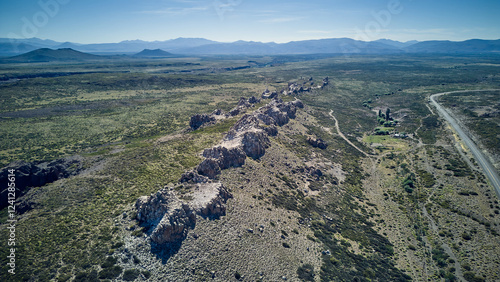 Majestic mountain peaks rising above the wilderness – a breathtaking display of nature’s grandeur.