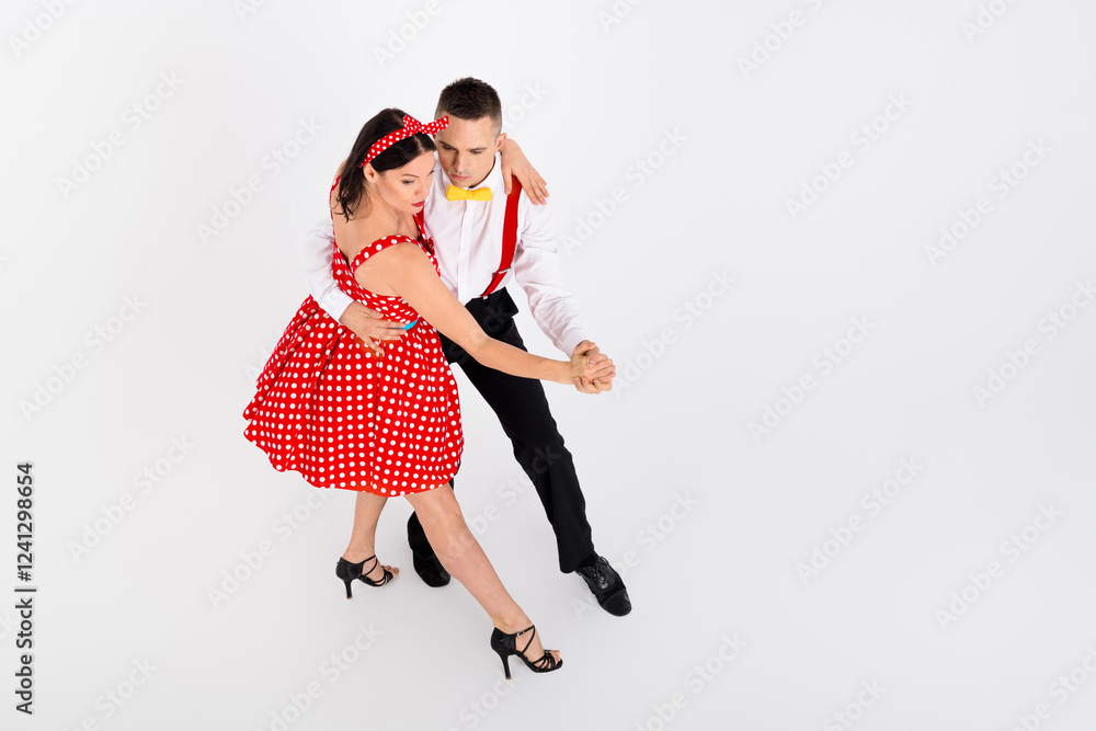Photo of attractive charming couple duet dancers in dancehall dance rumba salsa isolated on white color background Photo of attractive charming couple duet dancers in dancehall dance rumba salsa isolated on white color background
