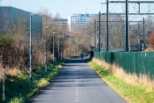 Wallpaper Mural The F212 fast cycling lane or fietssnelweg, a double asphalt lane along the railway track in Zellik, Asse, Belgium Torontodigital.ca