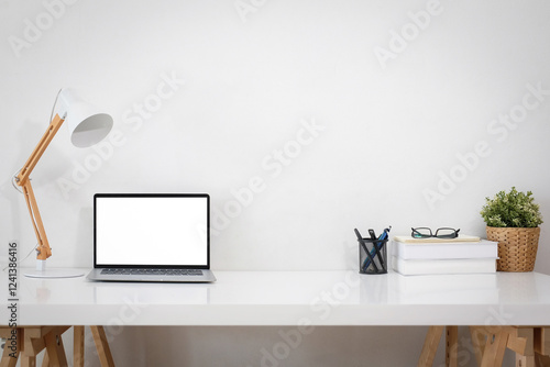 A white work desk stands near a white wall. front view