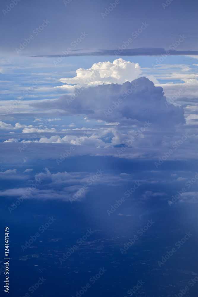 Big fluffy white clouds with the blue sky. Dramatic cloudscape. Nature scene. Nature background. Big fluffy white clouds with the blue sky. Dramatic cloudscape. Nature scene. Nature background.