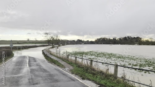 Flooded road and fields of Great Britain.