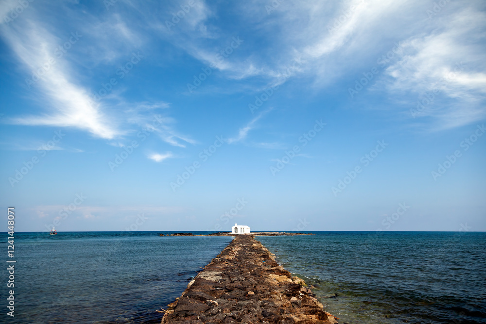 Agios Nikolaos Chapel in Georgioupoli, Crete—an iconic seaside sanctuary offering breathtaking views, tranquility, and a touch of Greek island magic.