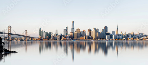 the skyline of san francisco during sunrise