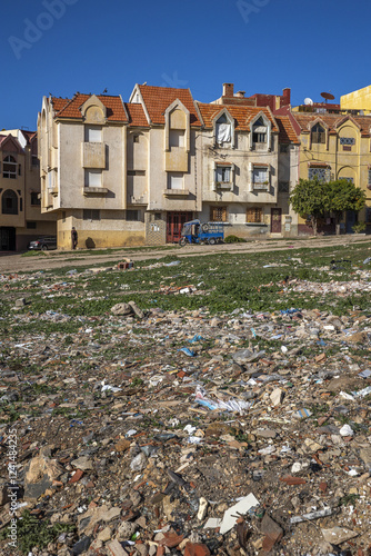 Trash and buildings in Azrou, Morocco photo