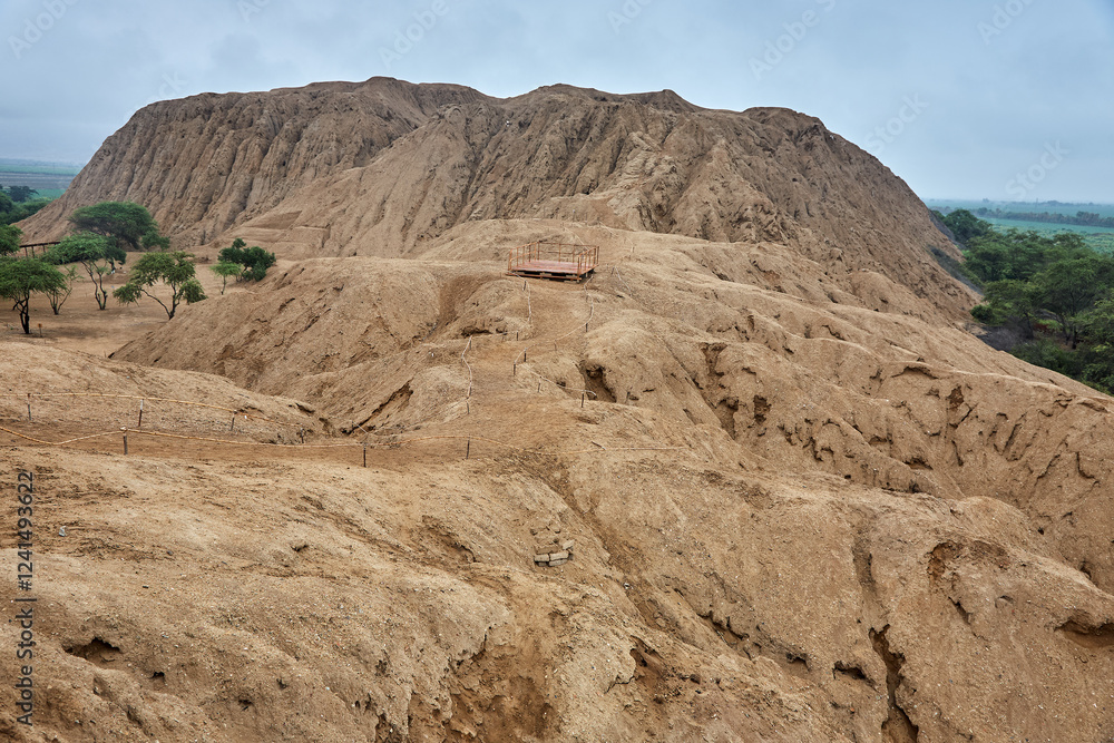 Huaca Rajada, the legendary site where the tomb of the Lord of Sipán was discovered. This ancient Moche pyramid in Lambayeque, Peru, holds some of the most extraordinary archaeological treasures. Huaca Rajada, the legendary site where the tomb of the Lord of Sipán was discovered. This ancient Moche pyramid in Lambayeque, Peru, holds some of the most extraordinary archaeological treasures.