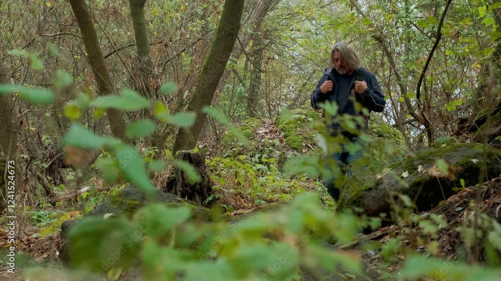 Man Enjoying Fresh Air in Autumn Forest Man Enjoying Fresh Air in Autumn Forest