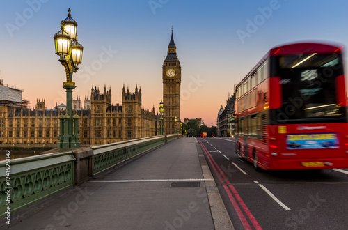 Big Ben and red bus in London at sunrise, UK