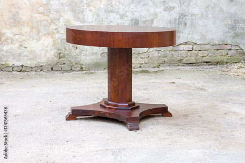 Old vintage antique round circular table with clipping path for isolation