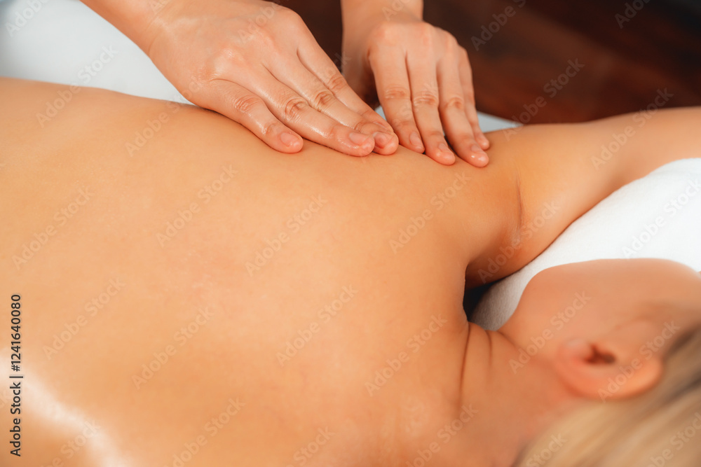 Closeup woman customer enjoying relaxing anti-stress spa massage and pampering with beauty skin recreation leisure in day light ambient salon spa at luxury resort or hotel. Quiescent Closeup woman customer enjoying relaxing anti-stress spa massage and pampering with beauty skin recreation leisure in day light ambient salon spa at luxury resort or hotel. Quiescent
