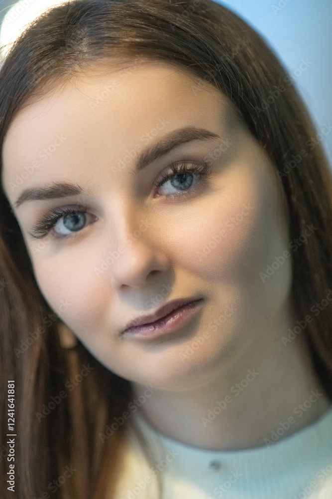 Portrait of a young beautiful dark-haired girl in a cafe. Portrait of a young beautiful dark-haired girl in a cafe.
