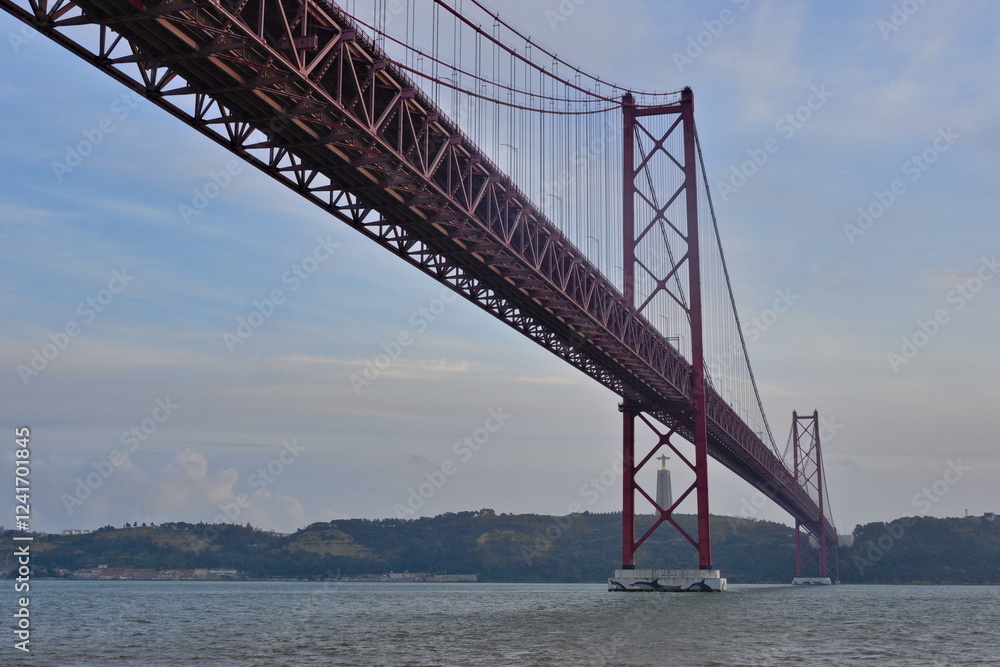 Fototapeta premium 25 april bridge in lisbon by sailing along the tajo estuary