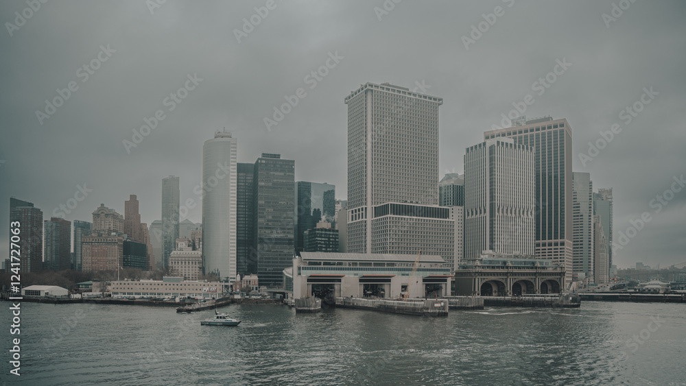 Fototapeta premium New York city view from Staten Island Ferry in a foggy day
