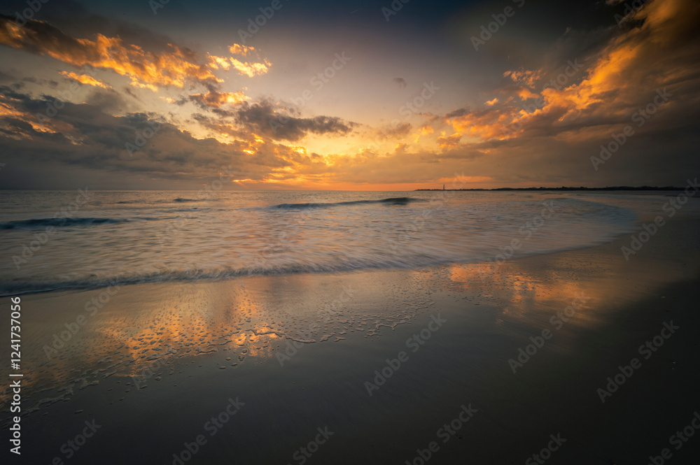 Fototapeta premium USA, New Jersey, Cape May National Seashore. Sunset on ocean and shore.