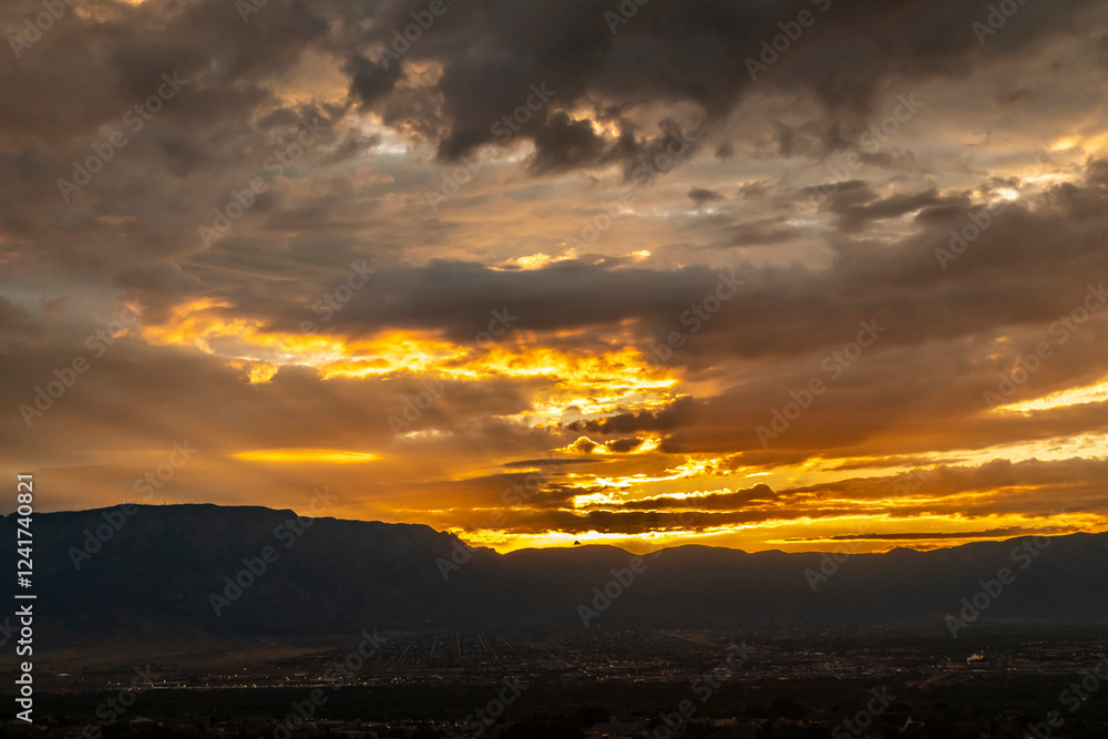 USA, New Mexico, Sandia Mountains. Cloudy sunrise over Albuquerque. USA, New Mexico, Sandia Mountains. Cloudy sunrise over Albuquerque.