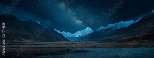 In the dark night, there is an expansive valley in front of towering mountains under a starry sky
