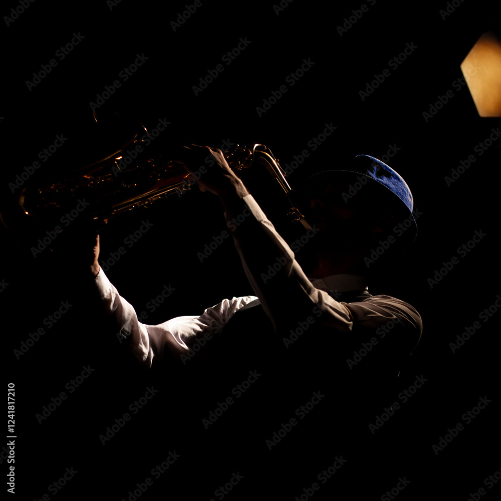 Musician silhouette on black background