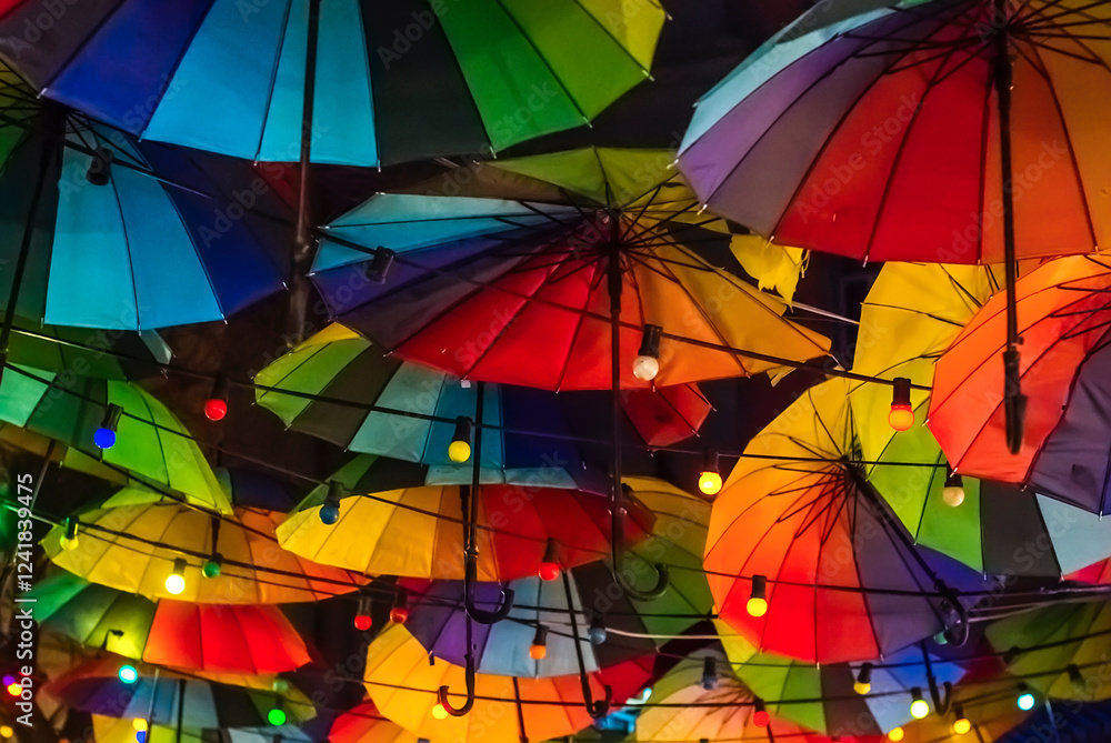 Fototapeta premium Colorful background of floating umbrellas