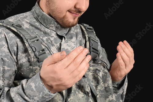 Male Jewish soldier praying...