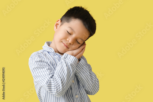 Sleepy little Asian boy in ...