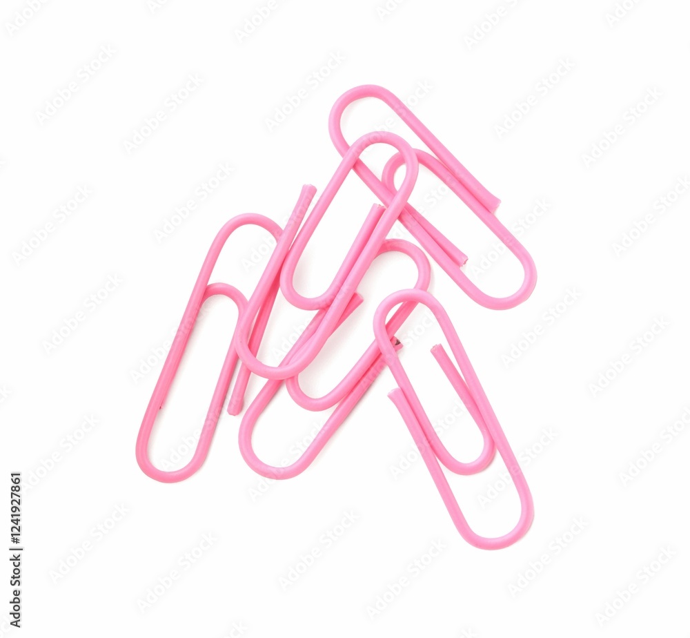 Pink paper clips isolated on white, top view Pink paper clips isolated on white, top view