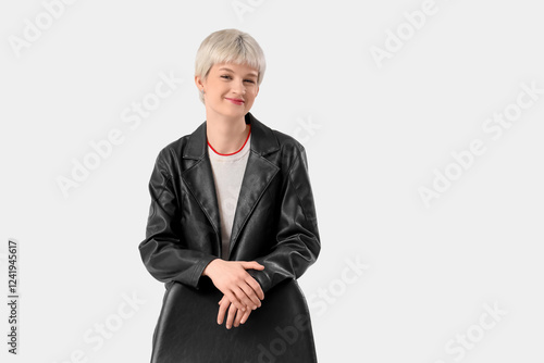 Stylish young woman in leat...