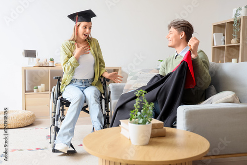 Female graduate in wheelcha...