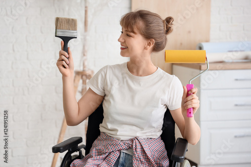 Young woman in wheelchair w...